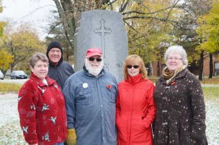 Linda Bates, John McDougall, Doug Lovegrove, Leann Benoit and Deb Lovegrove at the Cenotaph at McMullen Park
